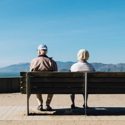 two seniors on a bench